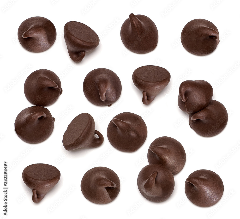 Fototapeta premium Scattered chocolate chips morsels pile from top view isolated on white background