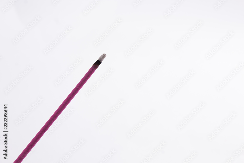 Purple Incence sticks isolated on white background Purple Incence sticks isolated on white background