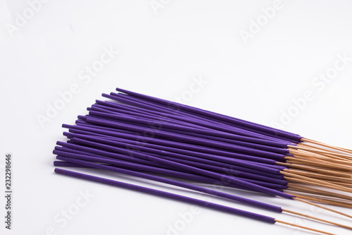 Foto Purple Incence sticks isolated on white background