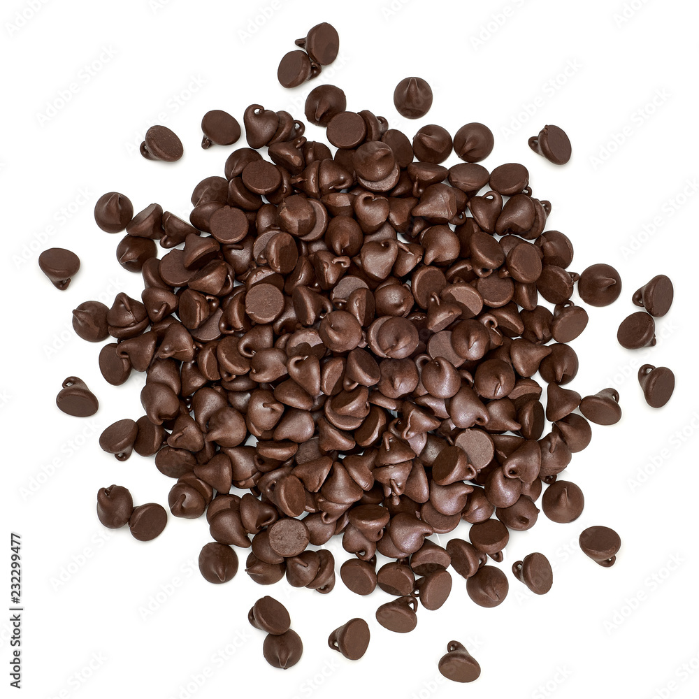 Chocolate chips morsels or chips pile top view isolated on white background Chocolate chips morsels or chips pile top view isolated on white background
