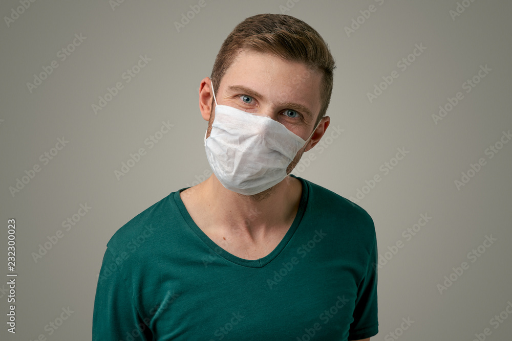 Photo of a sick man with a bandage on his face, infection or Allergy to something dressed casually, isolated on a white background. The concept of disease, epidemic, flu Photo of a sick man with a bandage on his face, infection or Allergy to something dressed casually, isolated on a white background. The concept of disease, epidemic, flu