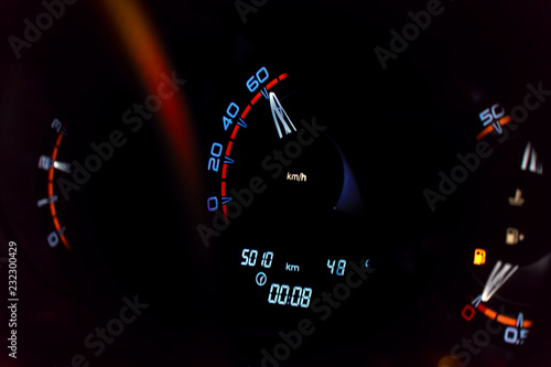 Speedometer in the car on the dashboard
