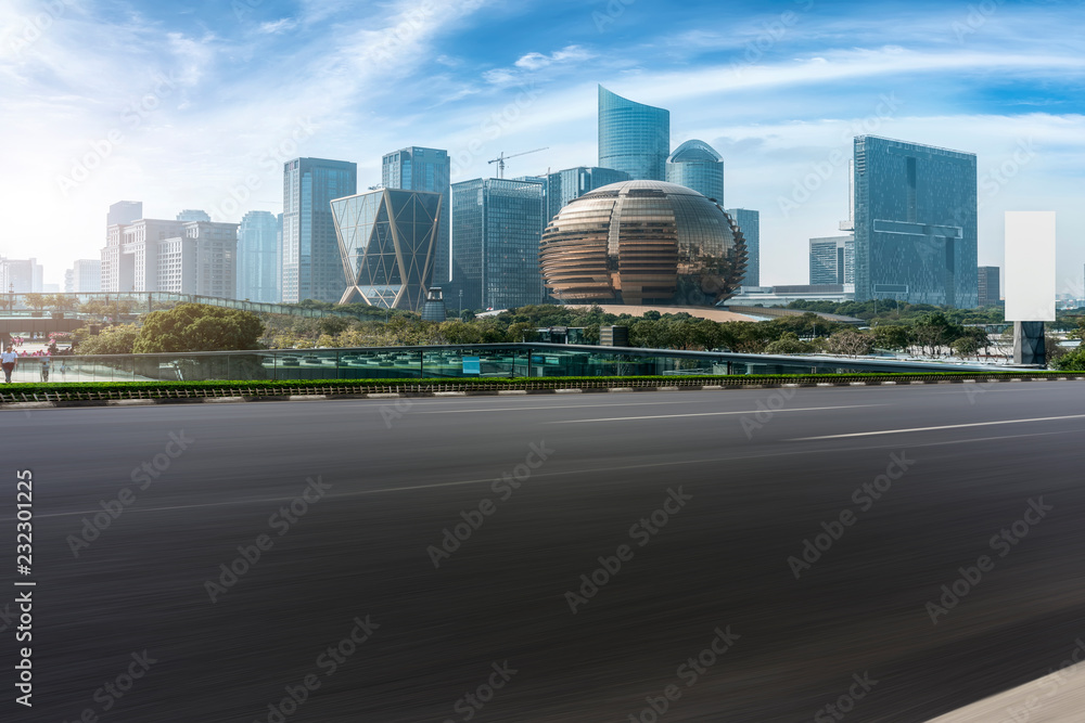 Urban road asphalt pavement and skyline of Hangzhou urban construction Urban road asphalt pavement and skyline of Hangzhou urban construction