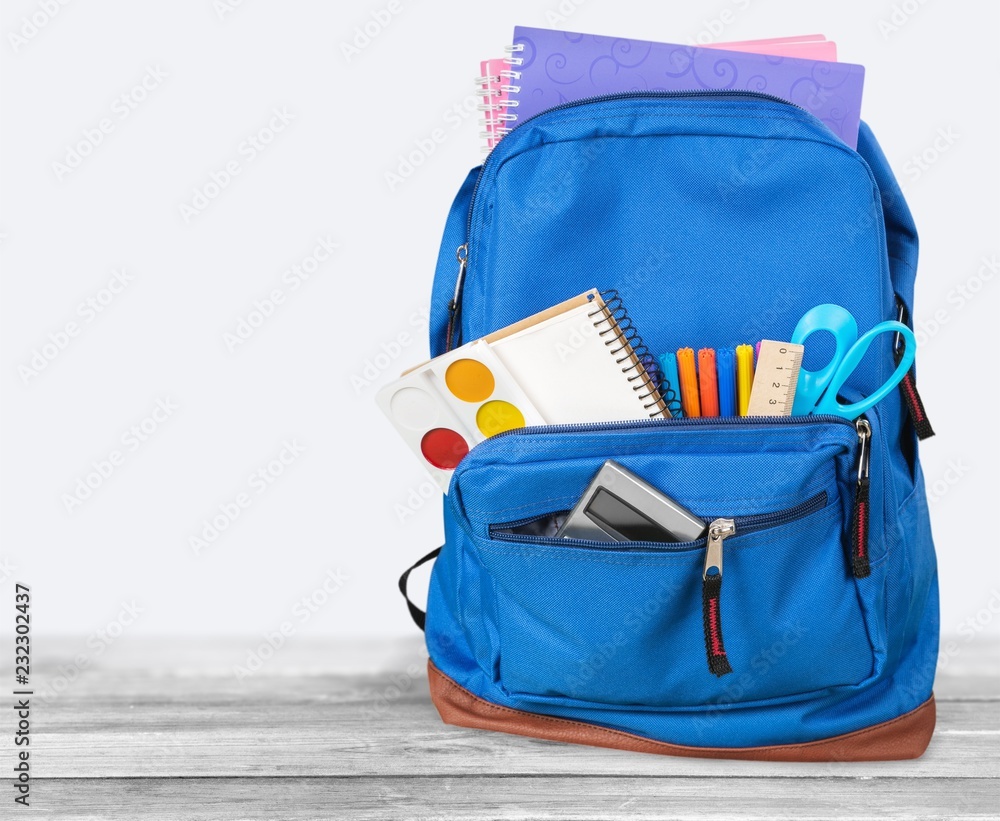 Naklejka premium Blue School Backpack on background.