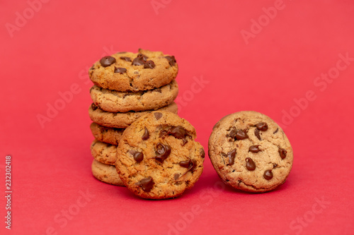 tasty cookies in detail, with red background.