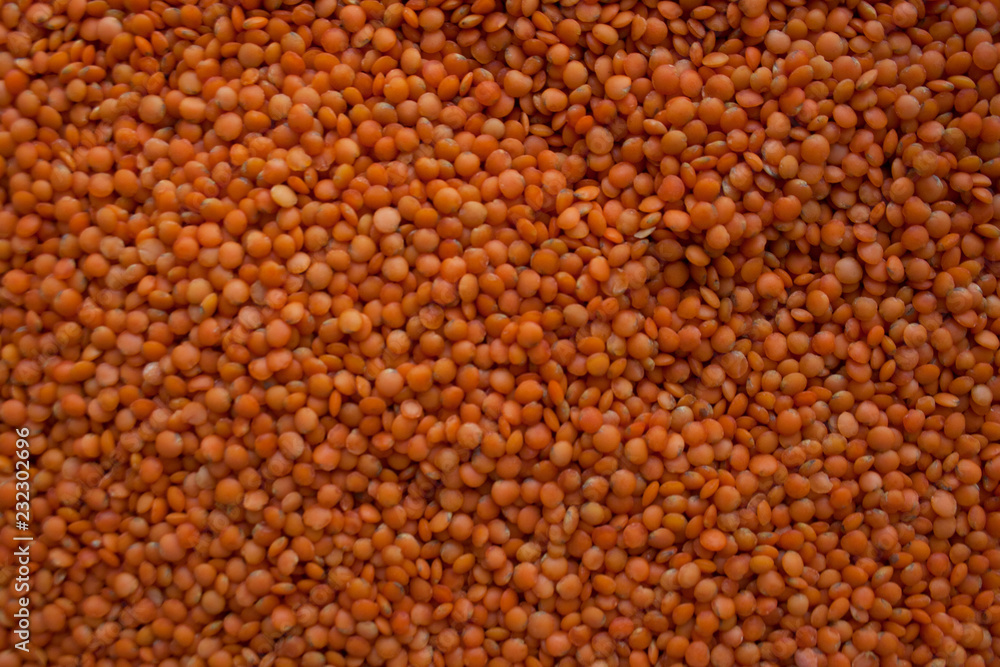 Raw red lentils texture from a high angle view Raw red lentils texture from a high angle view