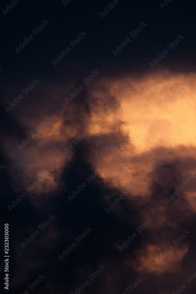 Naklejka premium Storm clouds and sunset