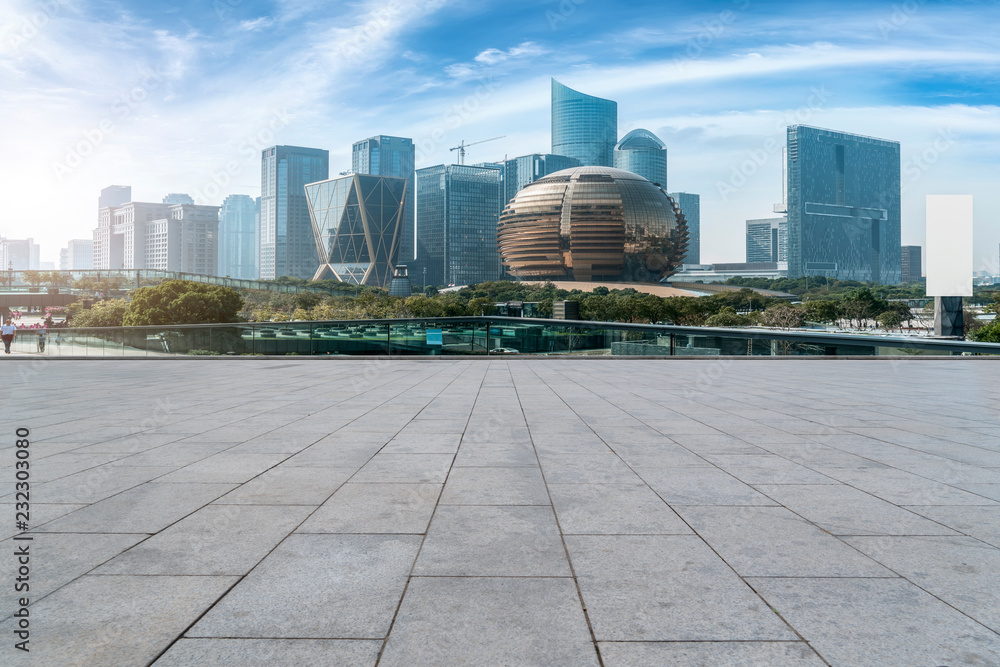 Blue sky, empty marble floor and skyline of Hangzhou urban architecture.