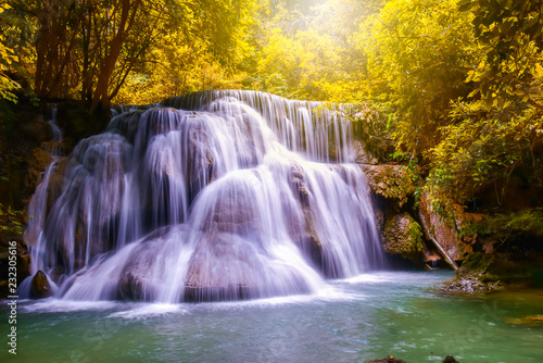Beautiful waterfalls in the middle of the forest  resulting in complete ecological system of the forest  nature park and outdoor in summer season.