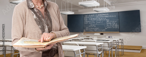 Ageing teacher in a classroom