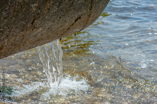 Discharge of toxic or contaminated water into a river or lake.