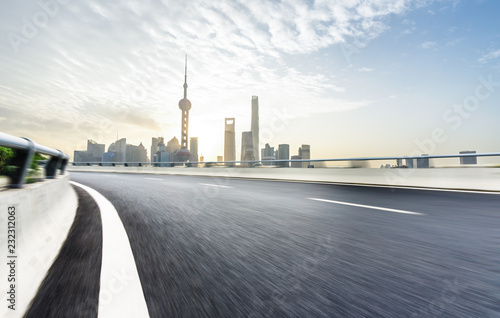 Photography empty asphalt road with city skyline