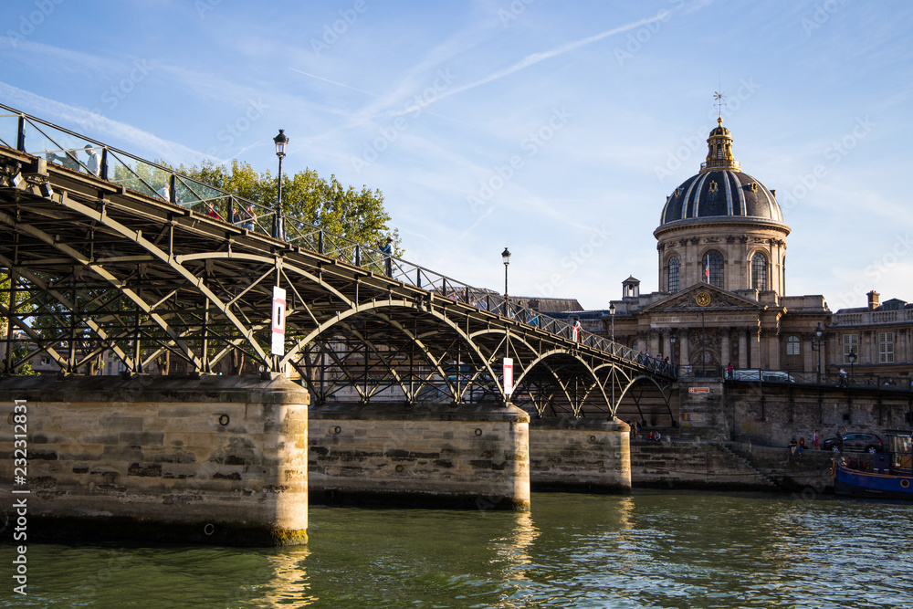 PARIS, FRANCE, SEPTEMBER 8, 2018 - Arts Bridge (Pont des Arts) with the Institute of France in Paris, France