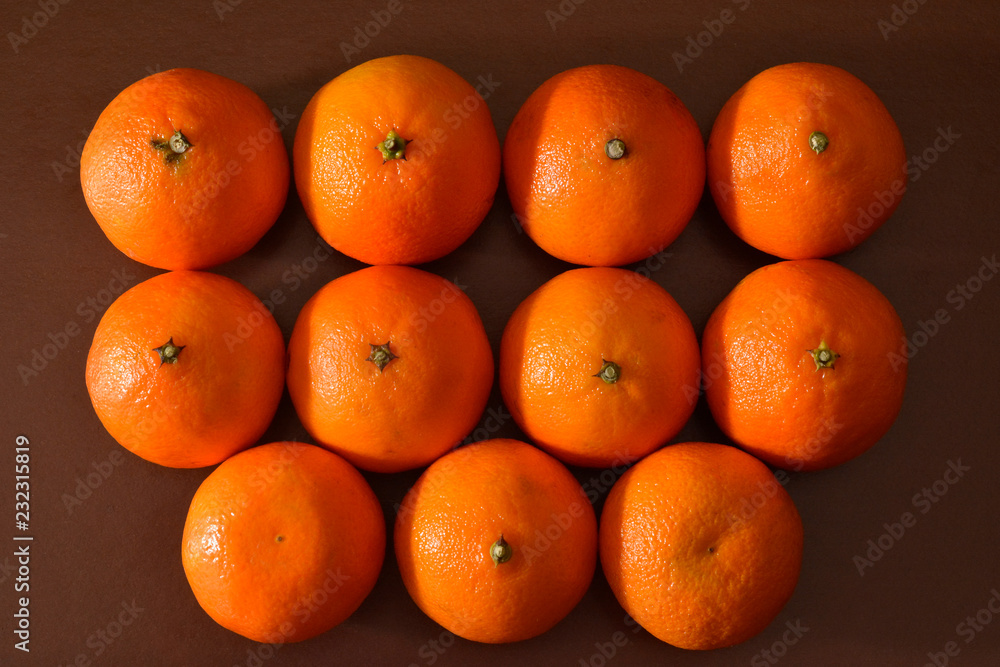 fresh oranges on black background