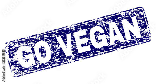 GO VEGAN stamp seal print with grunge texture. Seal shape is a rounded rectangle with frame. Blue vector rubber print of GO VEGAN tag with dirty texture.