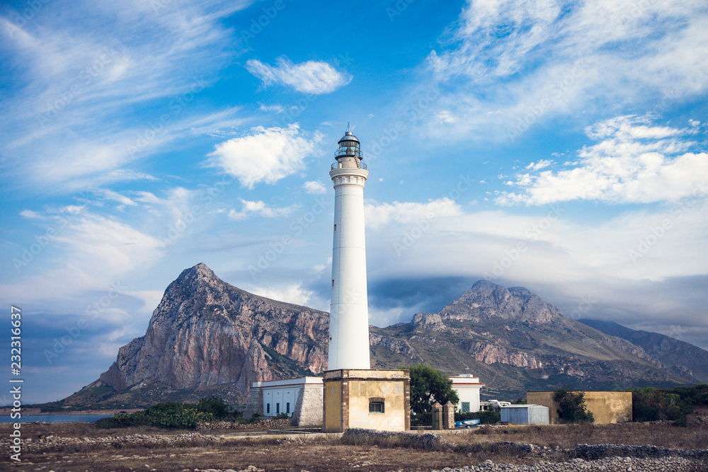 The summer view of lighthouse in San Vito Lo Capo in Sicily, Italia