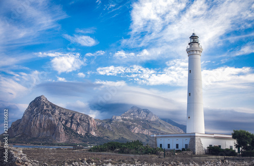 The summer view of lighthouse in San Vito Lo Capo in Sicily, Italia