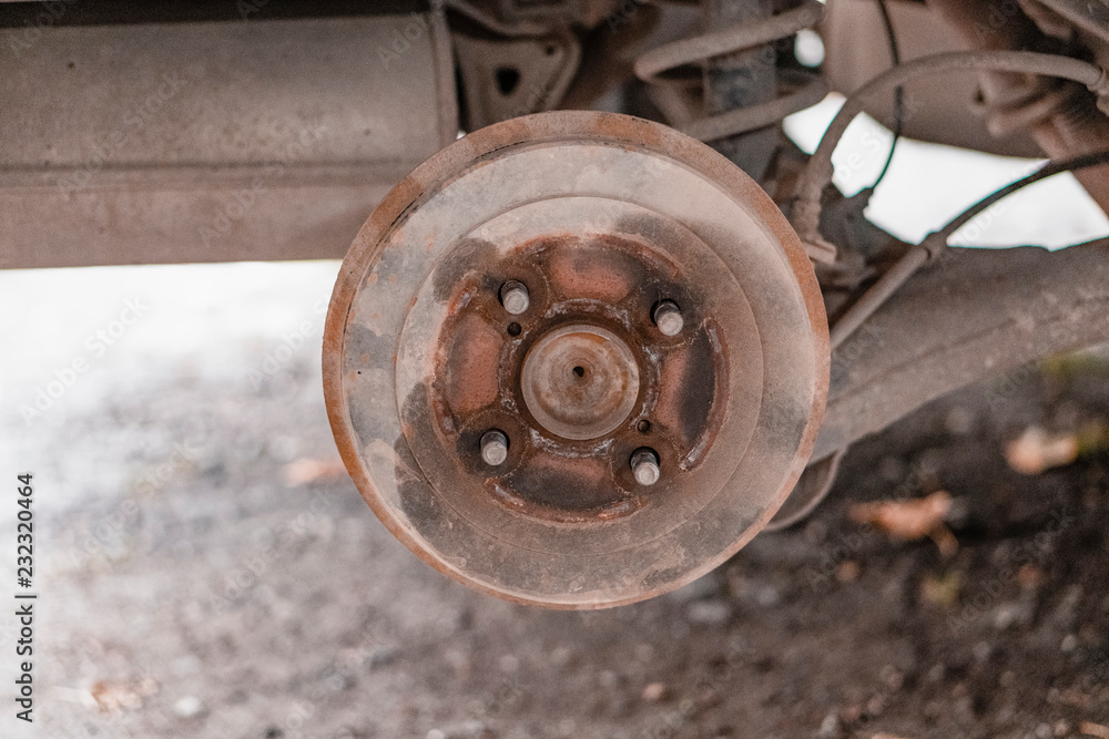 Small car repair. Wheel removed. brake pads