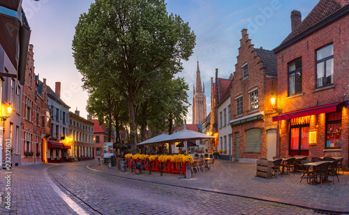 Walplein square in medieval fairytale old town in the evening, Bruges, Belgium