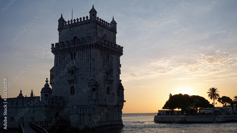 sunset at the tower of belem in lisbon sunset at the tower of belem in lisbon