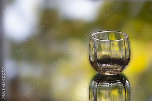 Blank of Glass with blurred nature background.