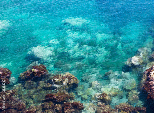 Crystal emerald turquoise sea water   shoreline in Marsaskala  Malta