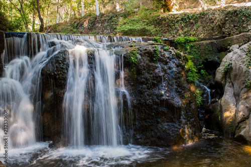 Fototapeta Naklejka Na Ścianę i Meble -  Waterfall in the summer forest
