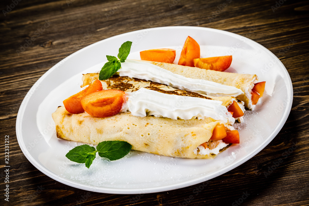 Sweet crepes with apricots