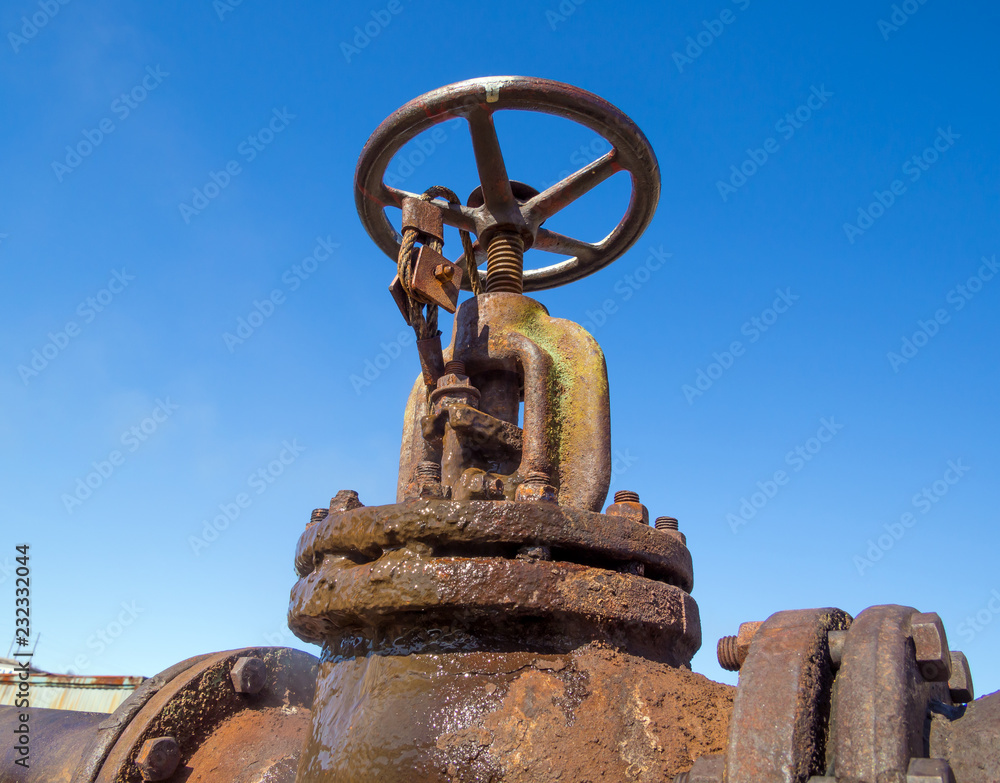 Fototapeta premium Old, rusty valve on the heating main