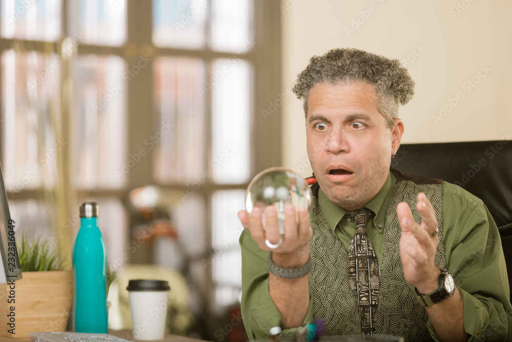 Shocked Creative Man with Crystal Ball Shocked Creative Man with Crystal Ball