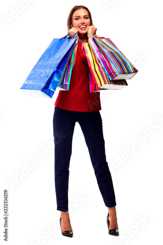 Pretty woman with shopping bags. Isolated on white background.