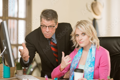 Woman Displeased with Male Colleague