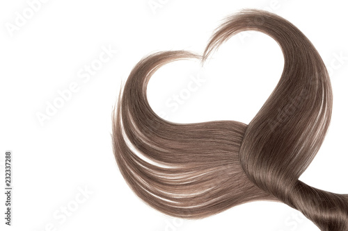 Brown hair in shape of heart  isolated on white background