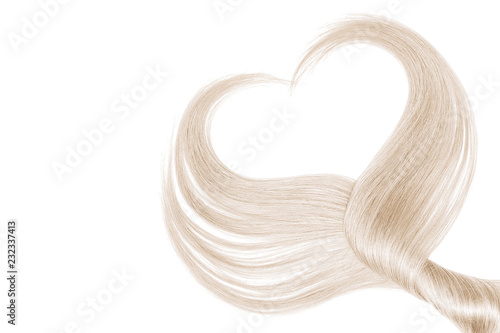 Blond hair in shape of heart  isolated on white background