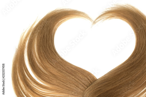 Brown hair in shape of heart  isolated on white background