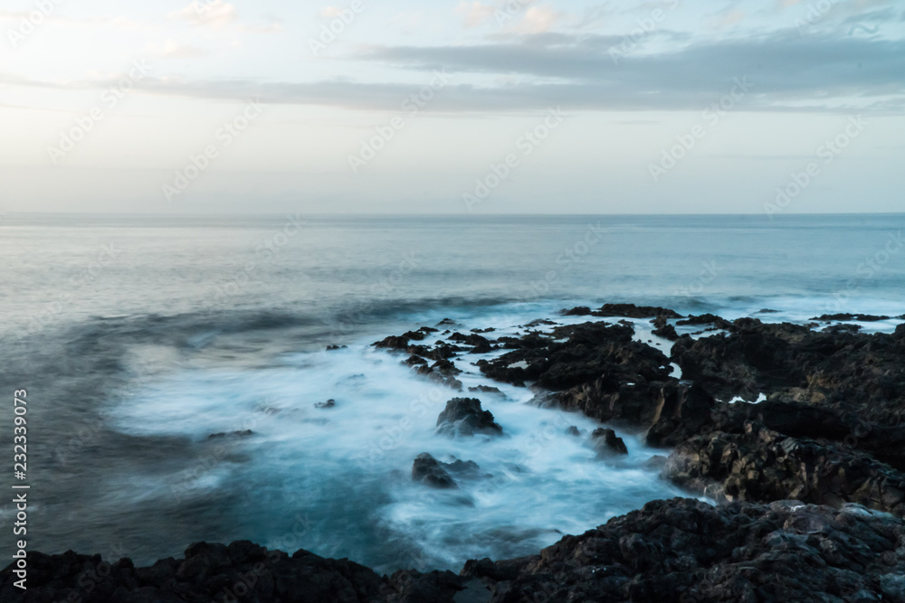 Tenerife Coast with rocks, waves time exposure