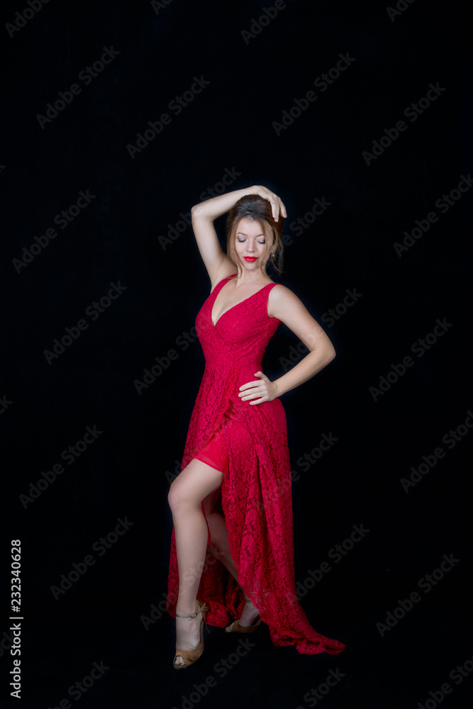 beautiful female dancer on black background in motion beautiful female dancer on black background in motion