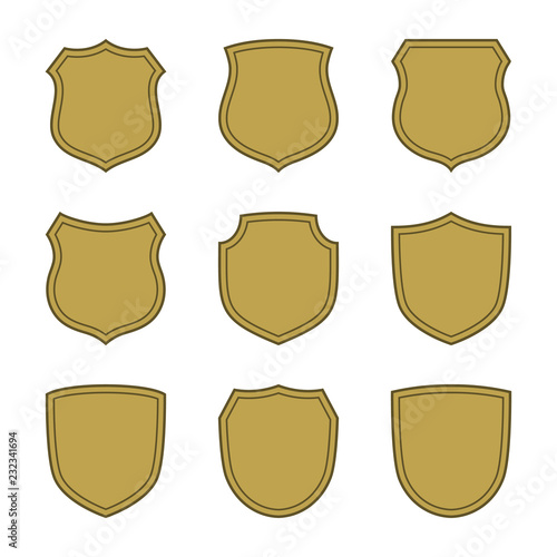 Shield shape gold icons set. Simple silhouette flat logo on white background. Symbol of security, protection, safety, strong. Element for secure protect design emblem decoration. Vector illustration