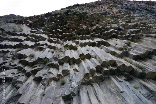 Hexagonal basalt columns "Symphony of the Stones" in the gorge in Garni (Armenia)