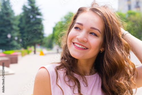 Portrait of young woman on the street