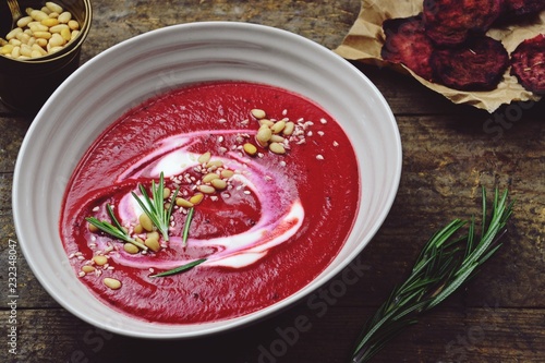 Beetroot soup isolated on wood background