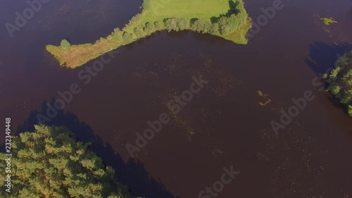 Small copy of Italian or Apennine Peninsula view from sky. Shape of Italy. Drone aerial shot. Stracha river - place close to Belarusian nuclear power plant. Beautiful european forest and river photo