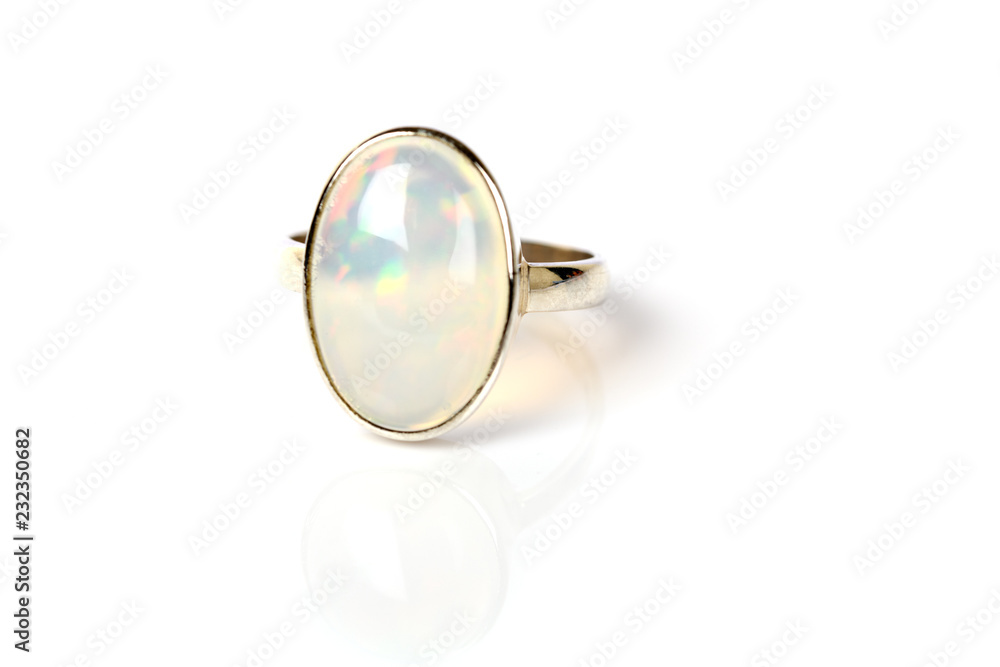 Opal Ring in silver iridescent on white background