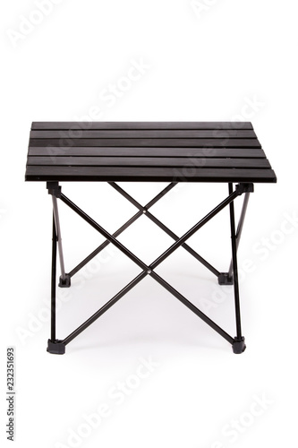 Black folding table for camping on white background