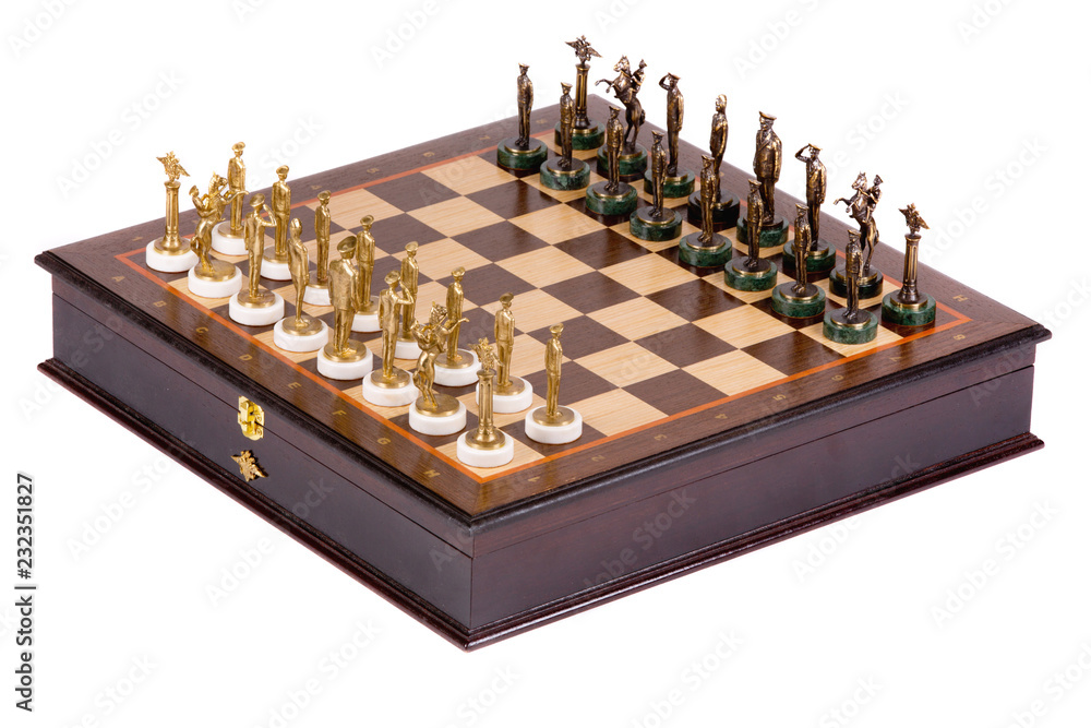 Chess Board with metal pieces on white background Chess Board with metal pieces on white background