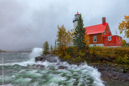 Eagle Harbor Lighthouse and Stormy Waters of Lake Superior photo