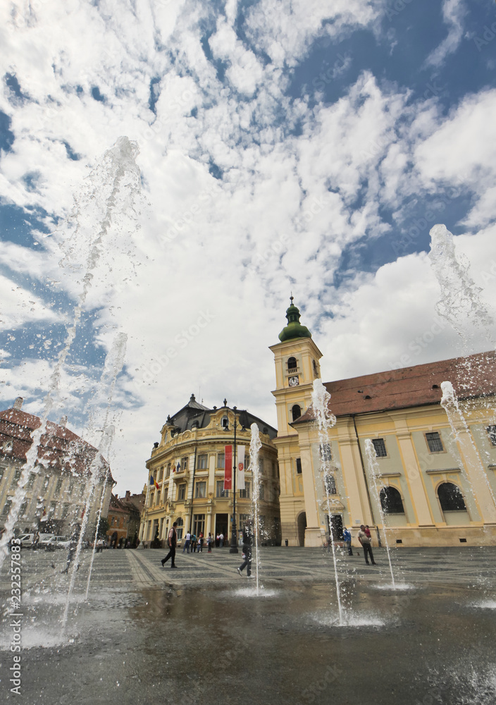 Artesian fountain water springing up from the ground in the Big Square of Sib