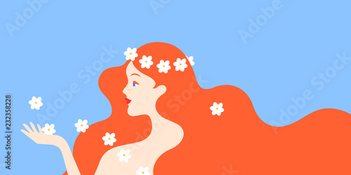 Redhead woman with daisies
