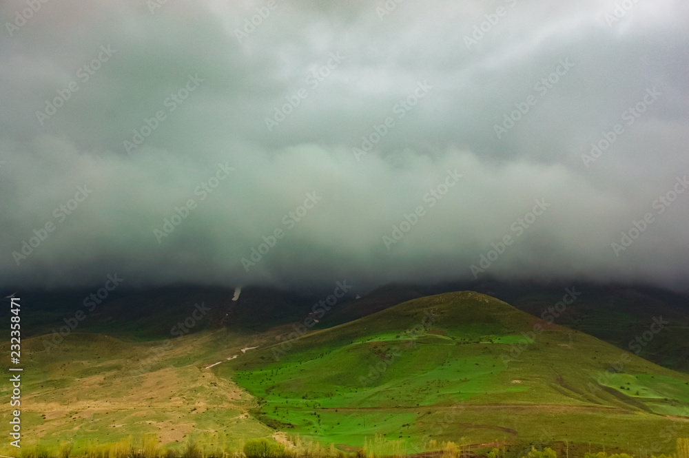 Landscape of mountain, cloudy and dramatic sky. Beauty in nature from Turkey. Clouds top on of mountain Landscape of mountain, cloudy and dramatic sky. Beauty in nature from Turkey. Clouds top on of mountain