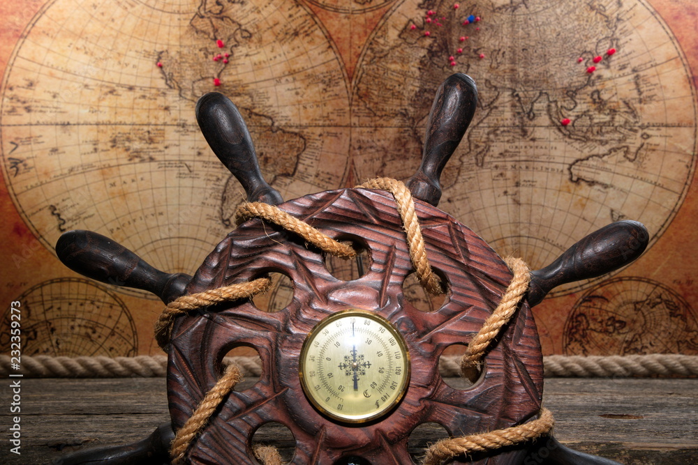 Old ship steering world map. Travel and